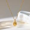 European and American Retro-plated 18k Gold Sun Relief Compass Round Pendant Necklace Women's Stainless Steel Jewelry Niche
