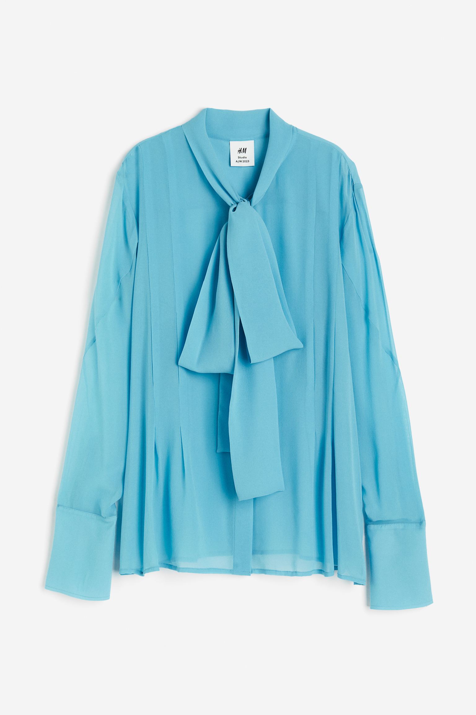 

Прозрачная шелковая блузка с бантом