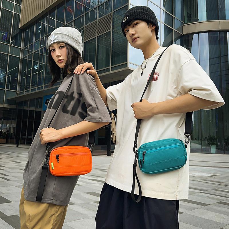 Simple texture small square bag men's and women's casual shoulder bag hand bag messenger bag mobile phone bag outdoor sports breast bag