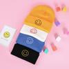 Stylish Autumn/Winter Smiley Face Wool Knit Fisherman Hat - Unisex, Warm, Solid Color with Folded Brim, Trendy Hip Hop Design.