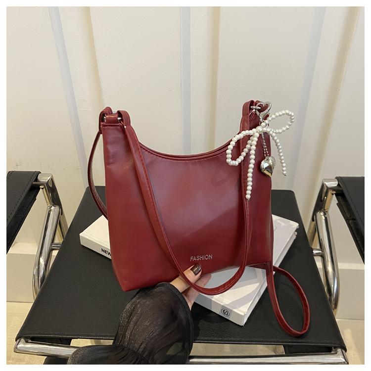 

Textured solid color casual large capacity 2025 simple summer new trend single shoulder crossbody women s underarm women s bag красный