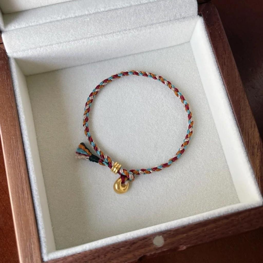 Handwoven Five-Color Cotton Bracelet with Little Fat Fu Pendant - Unisex and Joyful