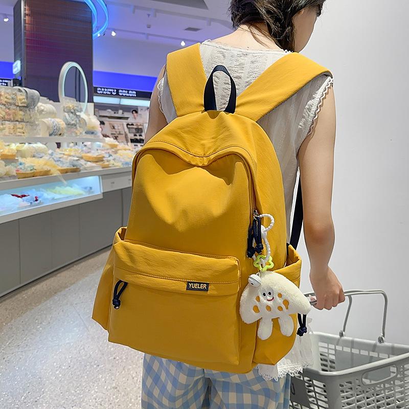 

Large Capacity Waterproof Backpack Versatile High Value Elementary School Travel Backpack with pendant