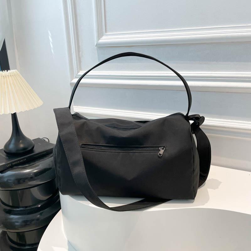 

Однотонная простая повседневная дорожная сумка нейлоновая легкая с разделением для сухого и влажного фитнес-сумка большой вместимости корейская версия сумка для хранения багажа чёрный