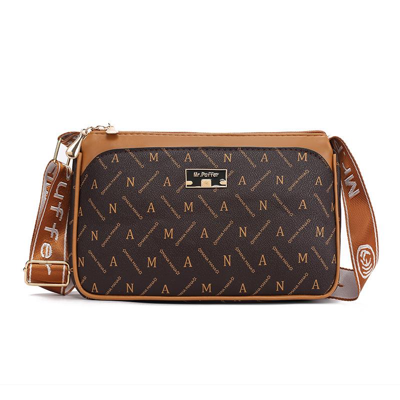 

Bag women s summer new oblique span small square bag fashionable versatile mobile phone change bag mother clutch bag