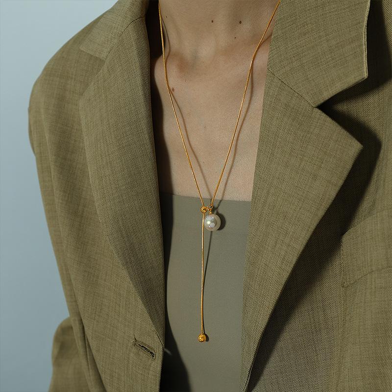 

2026 Personalized Snake Bone Chain Adjustable Tassel Medium and Long Necklace Glass Pearl Tangfeng Pendant 18K Gold Plated Sweater Chain 63+5CM