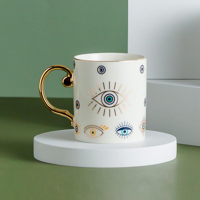 

Nordic Gold-Plated Ceramic Mug - Luxury Coffee, Water, or Milk Cup - Ideal for Office, Home, or Couple Gift Evil Eye Mug