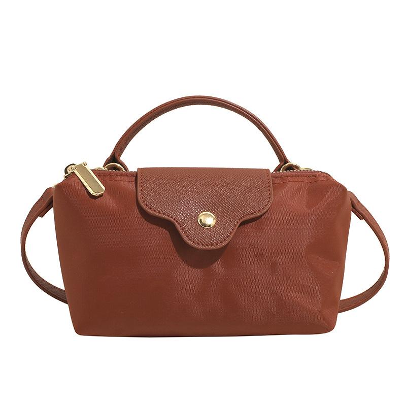 Wholesale new products niche simple contrasting color portable small bag women's leisure trendy versatile light splicing messenger change bag