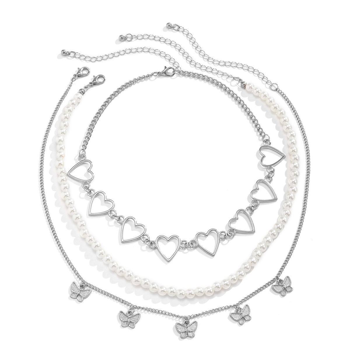 

Accessories, decorative Xin peach heart hollow neck chain multi-layer necklace, punk little butterfly imitation pearl necklace for women