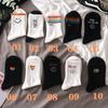 Black Cartoon Korean Women's Mid-Tube Socks - Autumn/Winter Trendy Sports Style, Versatile All-Match White Socks, Popular Among Students.