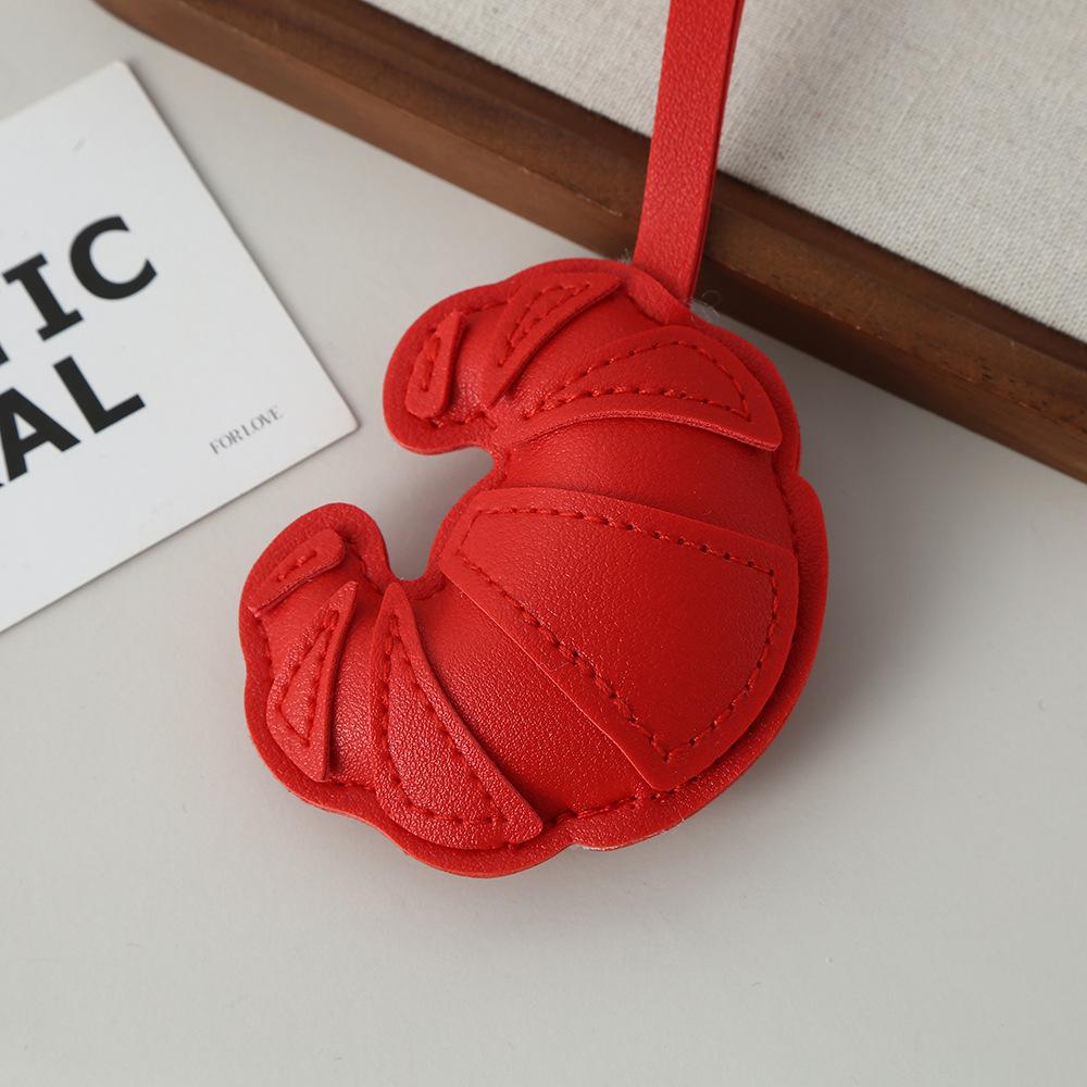 Croissant pendant creative simple bag keychain luggage pendant PU leather leather multi-layer patch pendant