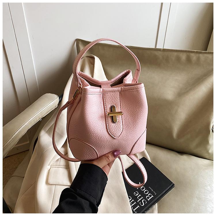 

Простое чувство портативной сумки-ведра женская рабочая сумка через плечо 2025 ранняя весна маленькая свежая модная сумка-мессенджер розовый