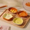 Cute bread-shaped ceramic sauce dish, cartoon smiley face condiment dish, creative kitchen dipping dish and snack dish tableware set.