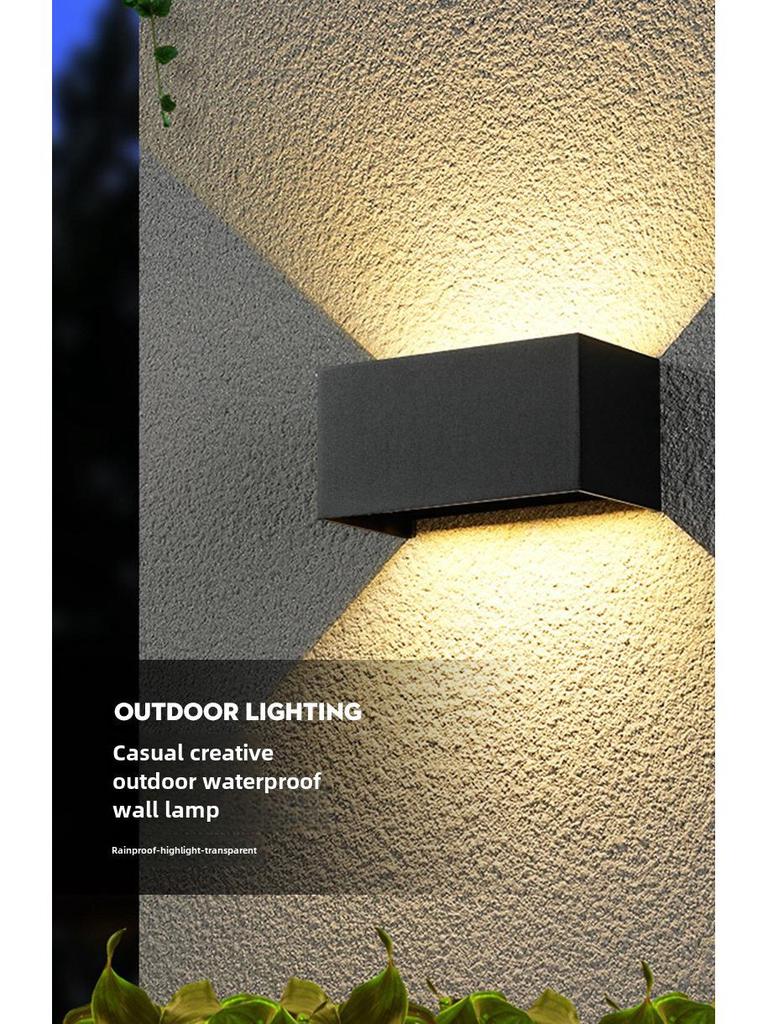 LED Outdoor Four-Leaf Clover Wall Light - Up and Down Beam Decoration for Garden and Exterior Walls.