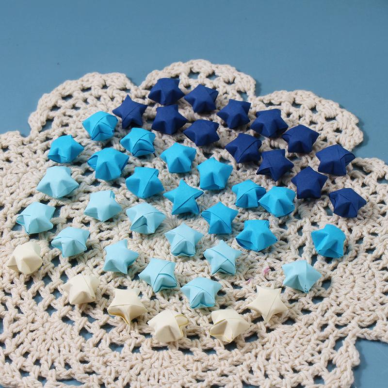 Modrá řada Origami Stars Dekorace Skládací papír Origami Paper Stars DIY Umělecké řemeslo Svatební party Domácí dekorace
