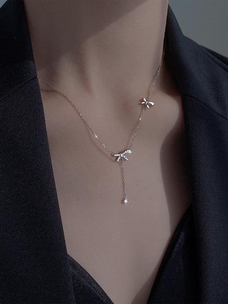 Elegant Japanese & Korean Bow Pendant Necklace: Light Luxury with Tassel for Women