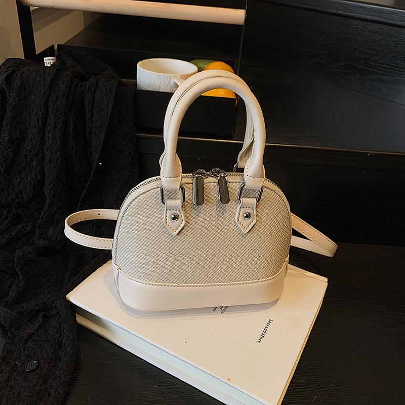 

Versatile women s bags fashionable and popular shoulder shell bags women s niche texture women s handbags ins messenger bags