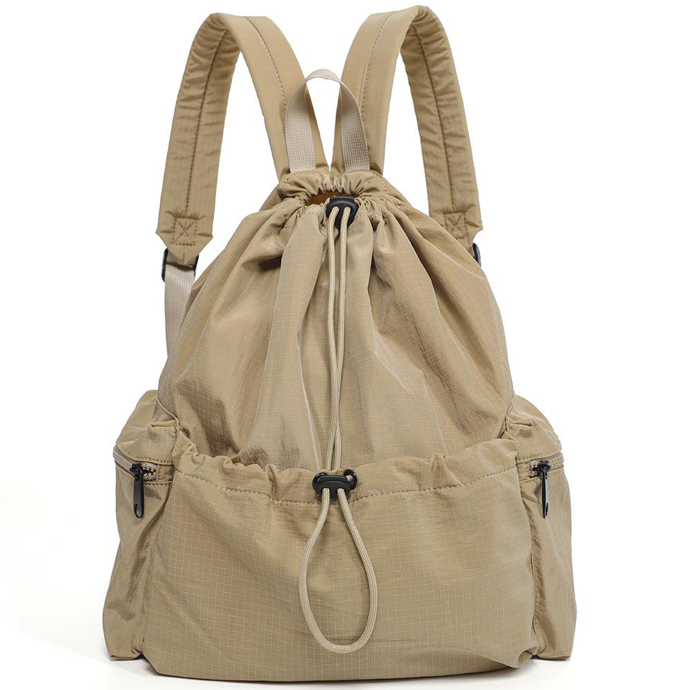 

2025 spring new nylon waterproof lightweight backpack small backpack female cycling sports college student schoolbag travel