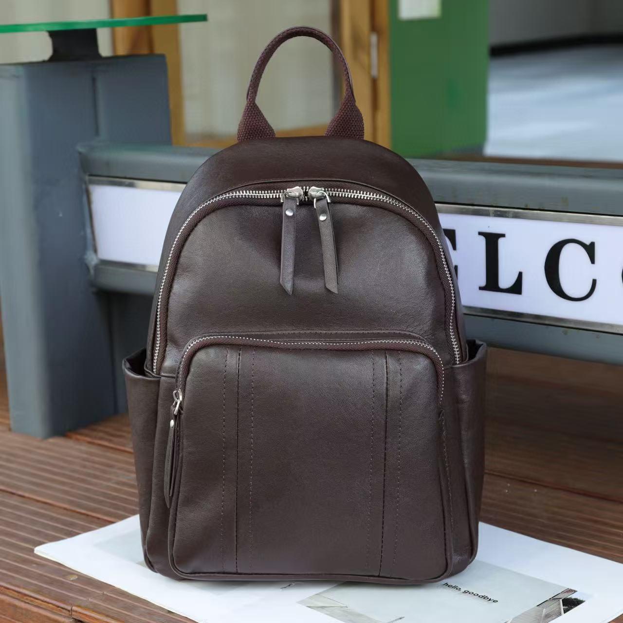 

2025 Women s Casual Genuine Leather Large Capacity Travel Backpack 26*13*33 cm