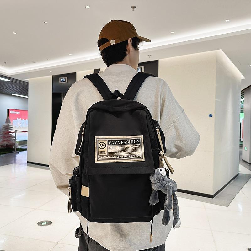New large-capacity schoolbag men's trendy cool couple casual backpack Korean version ins junior high school student computer backpack