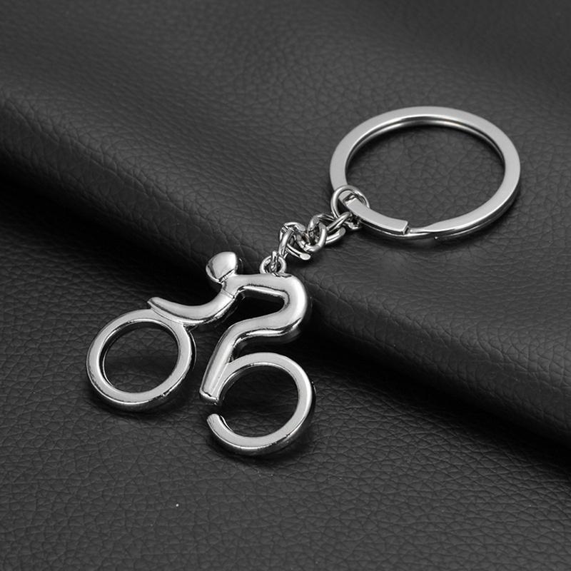 1ks Sportovní Muž Klíčenka Kovové Kolo Kolo Cyklistika Jízda Klíčenka Klíčenky Závěsné Doplňky