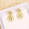 White Mother-of-Pearl Compass Stud Earrings with Zircon Encrusted Eight-Pointed Star
