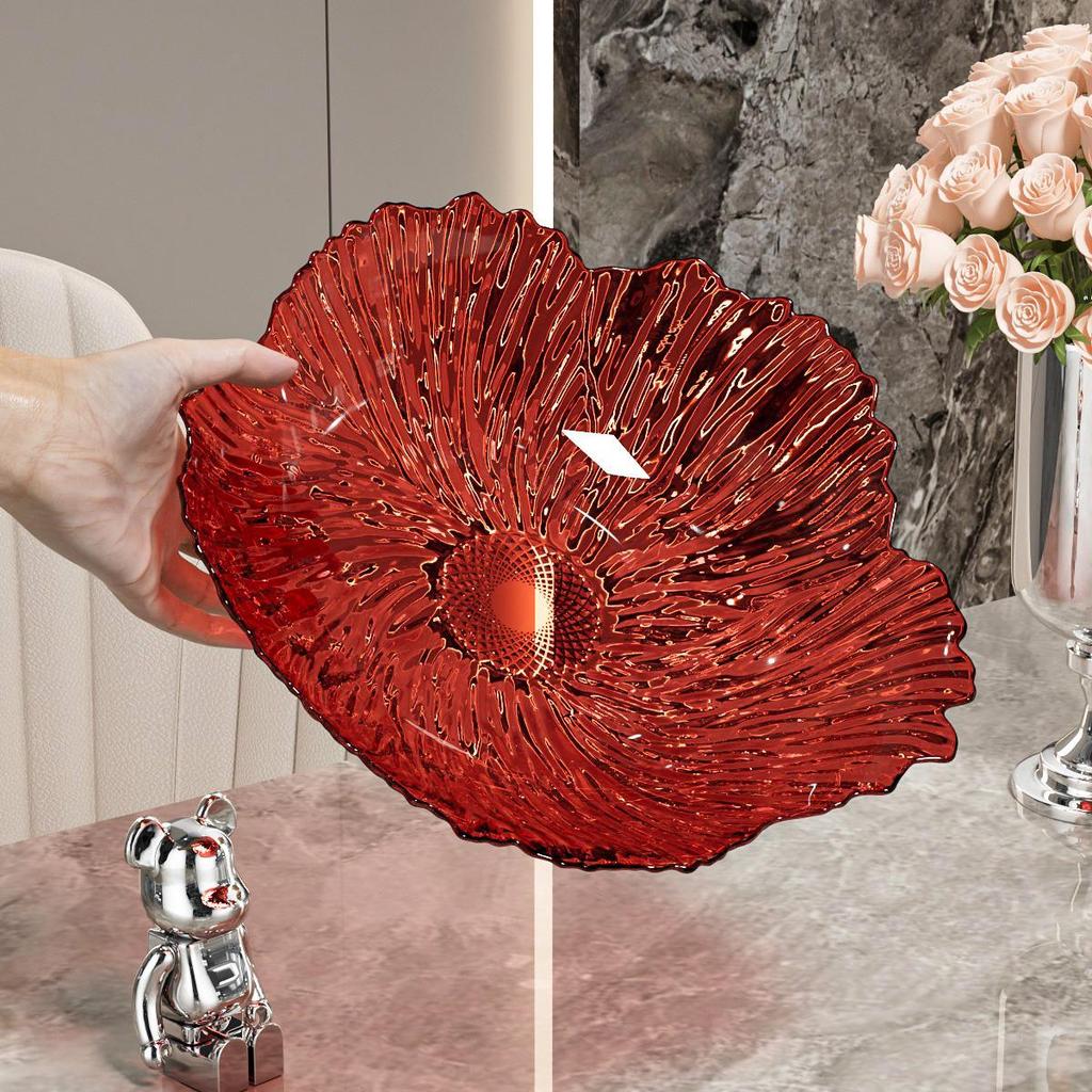 Transparente Obst- und Snack-Präsentationsplatte mit hohem Fuß: Modernes Licht-Luxus-Design für Wohnzimmer-Couchtische.