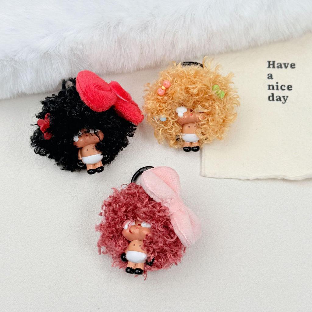 Crying Doll Keychain with Wig & Bow - Creative Cartoon Pendant for Bags & Phones