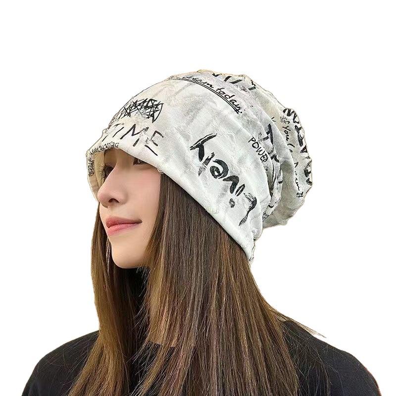 Korean-Style Distressed Beanie: Women's Ripped Letter Slouchy Hat for Large Heads, Small Face Look, Trendy Yarmulke Style.