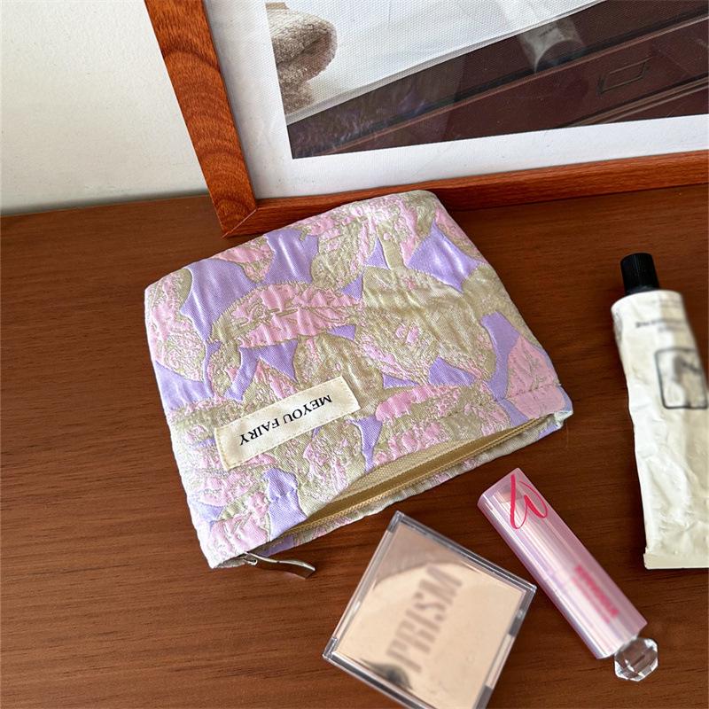 "Compact Fresh Cosmetic & Skincare Travel Bag - Portable Handheld Storage for Toiletries & Underwear"