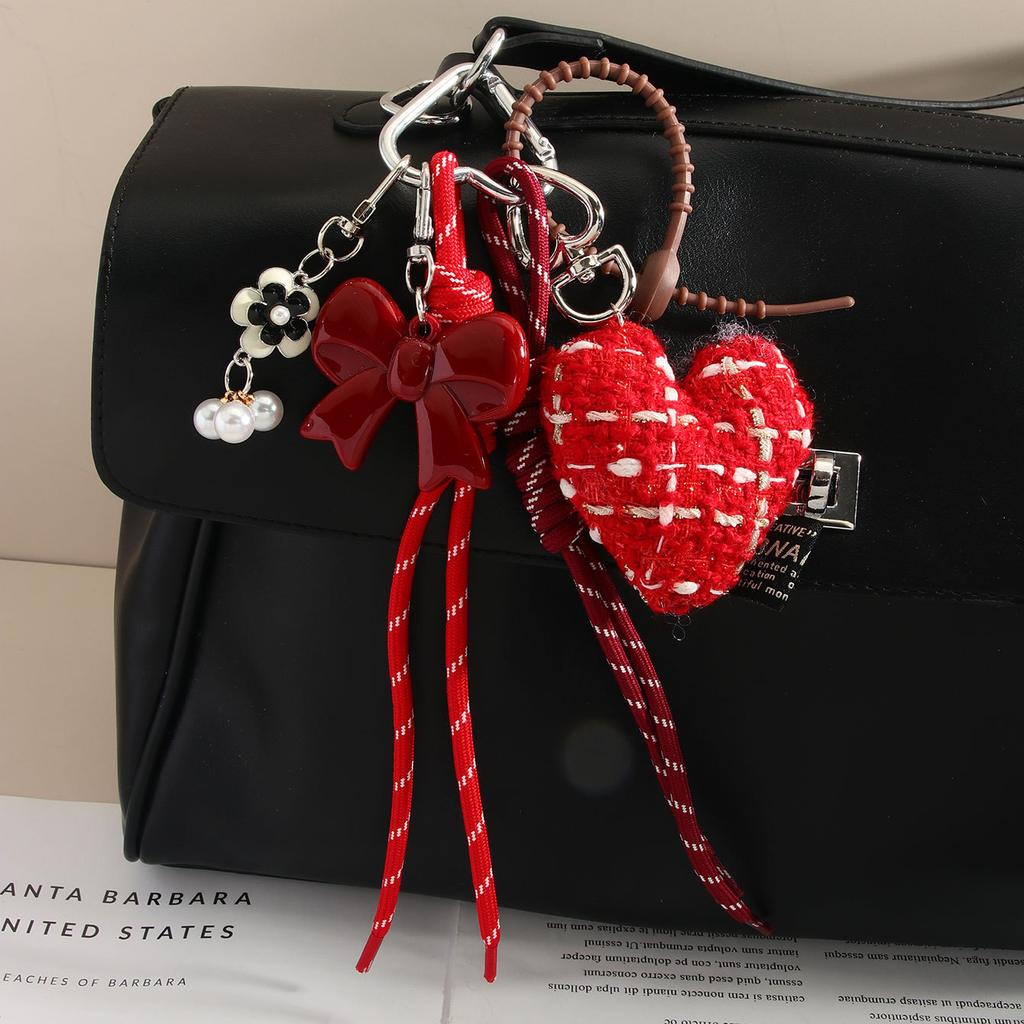 Moda ins tessuto ragazza amore fiocco corda intrecciata borsa senso di alta gamma ciondolo appeso stile miu ciondolo borsa a vento