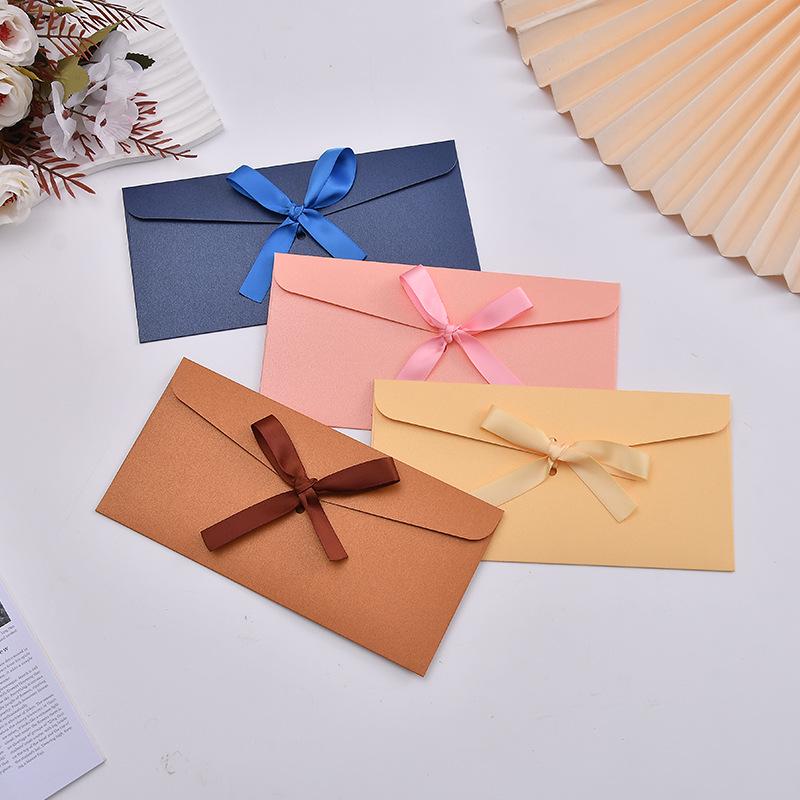 Elegant Pearlescent Greeting Card with Bow and Ribbon Envelope