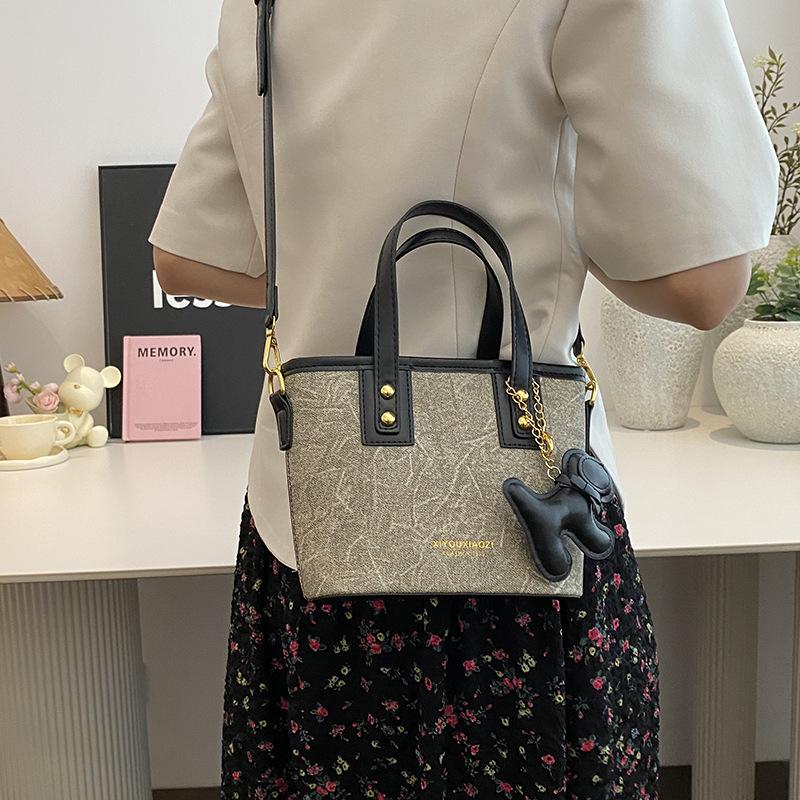 Simple Handbag Bag Women's High-end Sense Versatile Single Shoulder Oblique Span Bag Niche Design Commuter Bucket Bag