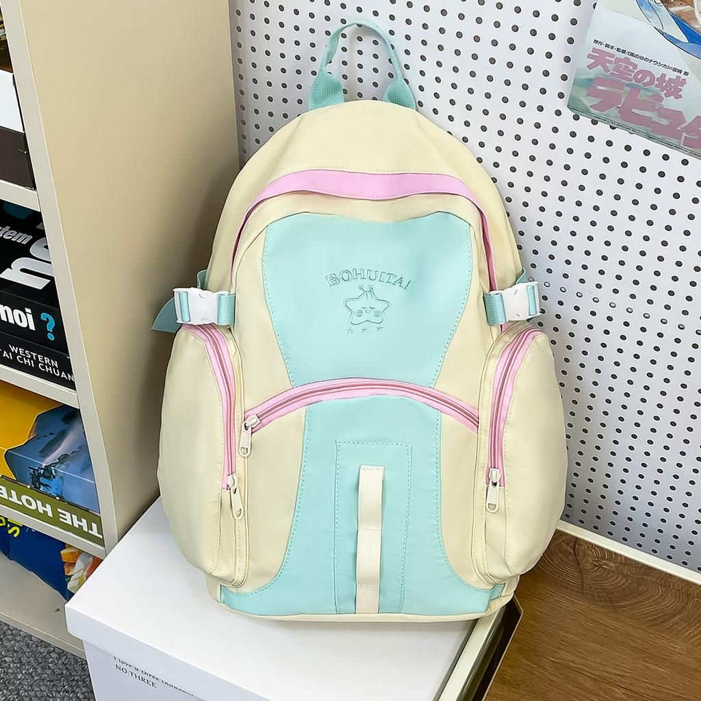 Korean version of large-capacity junior high school student schoolbag travel backpack high-value ins wind niche contrasting color backpack women