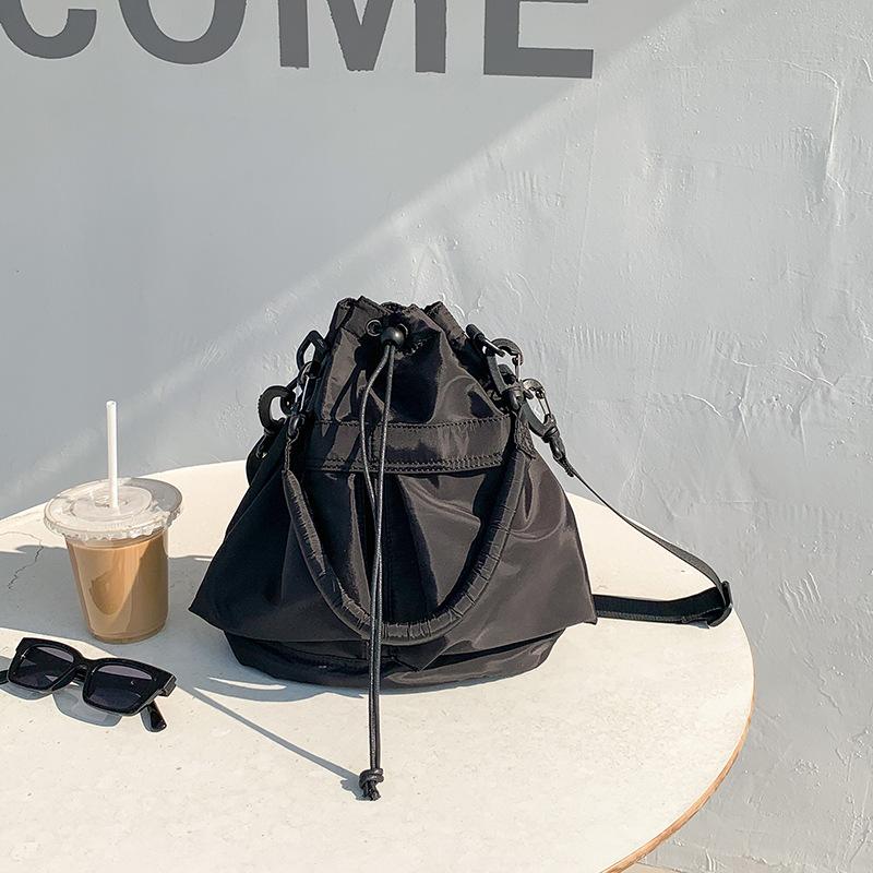 Designer Bucket Bag  Polyester Versatile Drawstring Pleated Bag Large Capacity Lightweight Unisex Style Handheld Nylon Bag