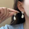 French pearl oval shell earrings white flower high-end stud earrings fashion temperament light luxury earrings women