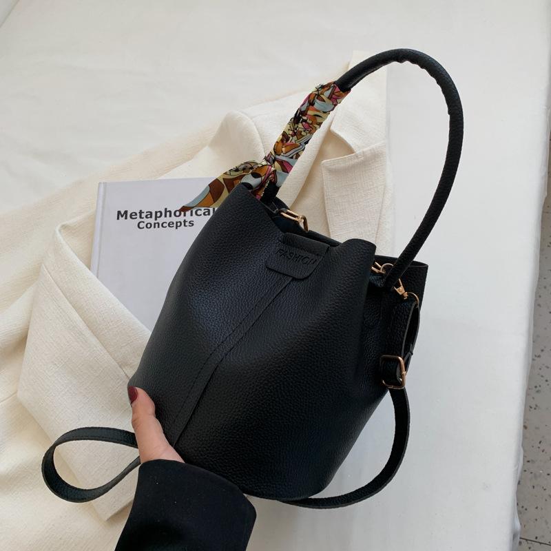 New Bag Women 2025 Korean Version of Fashion High-end Silk Scarf Portable Bucket Bag Niche Design Foreign Style Messenger Bag