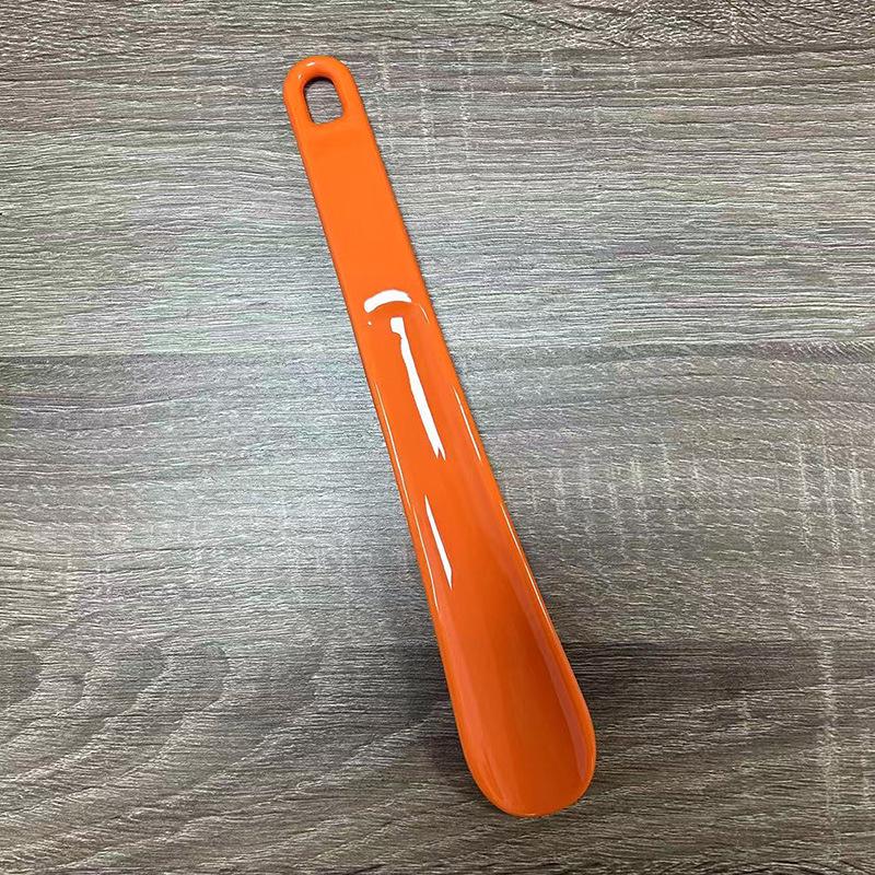 

Compact 25cm Black Plastic Shoehorn - Portable & Easy to Use Shoe Lifter помаранчевий