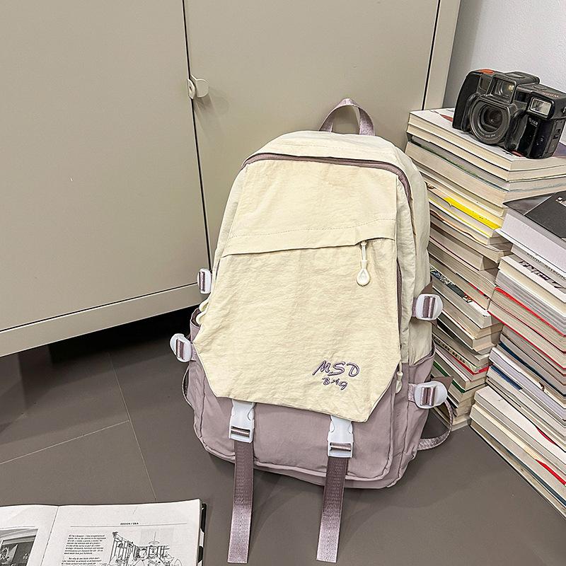 New Schoolbags  Large Capacity  Light Girls  Cute Multifunctional Anti Splashing Couple Backpacks.