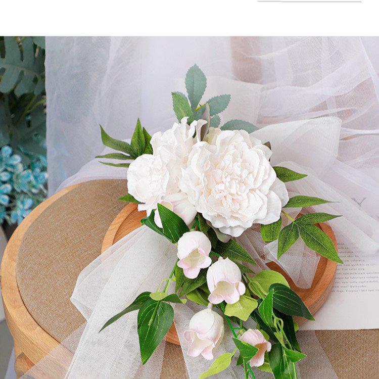 Western Wedding Outdoor Decor: Forest-Style Artificial Floral Chair with Light Luxury Wind Chime