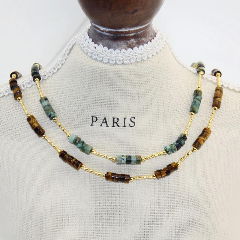 Tigerauge Perlenkette: Hochwertige Luxus-Claviculakette aus Titanstahl mit Naturstein für Herbst/Winter.