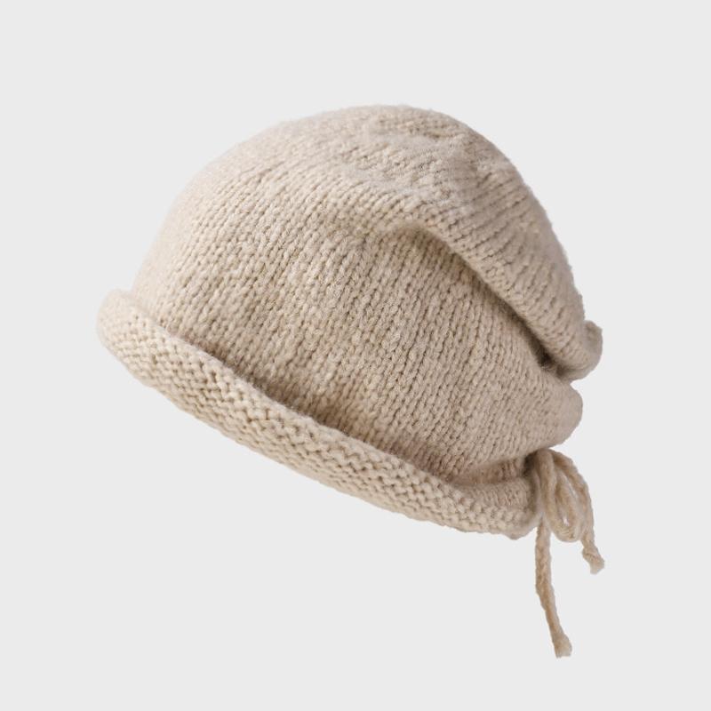 

Вязаная шапка на шнурке Женская шерстяная шапка бежевый
