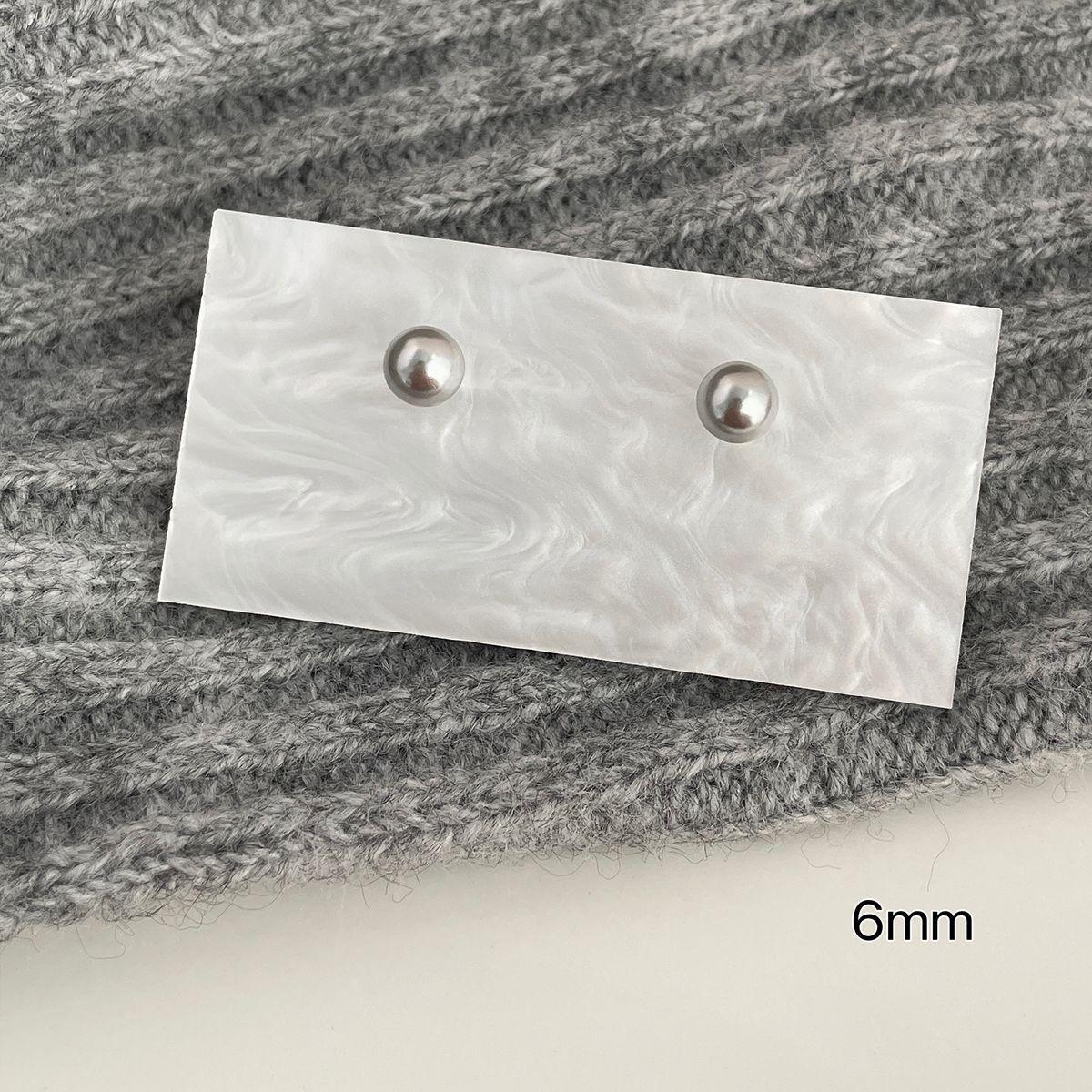 

Елегантні сріблясто-сірі сережки з перлами: Високоякісна срібна голка 925 проби, мінімалістичний дизайн, холодний жіночий стиль.