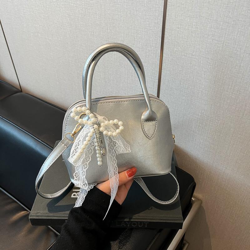 Korean Niche Fashionable Portable Shell Bag Women's 2025 Spring New Foreign Style High Value Single Shoulder Messenger Bag