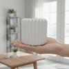 Modern white triangular grooved flowerpot for plants