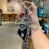Portachiavi Trendy a Forma di Cuore in Pelle con Fiocco Portachiavi Delicato con Perline Portachiavi per Auto Decorazione Ciondolo per Borsa Regalo per Ragazze