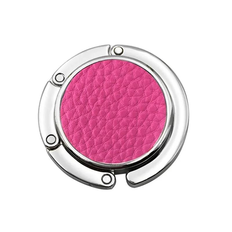 

Модний тримач для сумки, вішалка для сумочки, складаний тримач-гачок, портативна стійка для ключів, настільний гачок, обладнання для подорожей, вішалка для зберігання на відкритому повітрі рожевий червоний колір