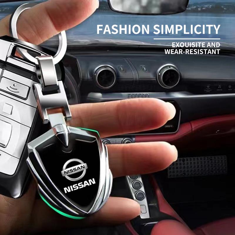 1Pcs Car Emblem Stying Metal Key Rings Shield Shaped Keychain for Nissan Nismo GTR Altima Qashqai Almera Navara