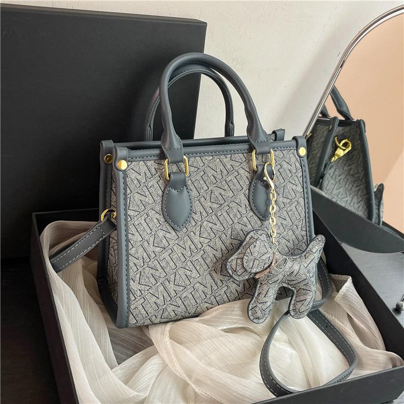 New high-end fashion contrasting color commuter bag portable shoulder oblique span women's bag