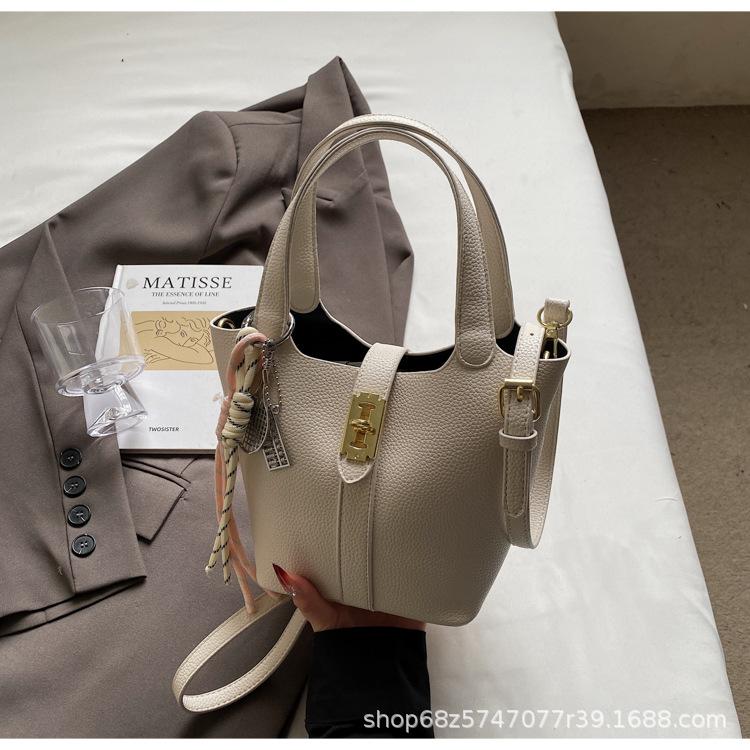 Small Bag Women's Spring Simple Hand Carrying Bucket Bag Casual New Commuter To Work Shoulder Messenger Bag Korean Version 2025